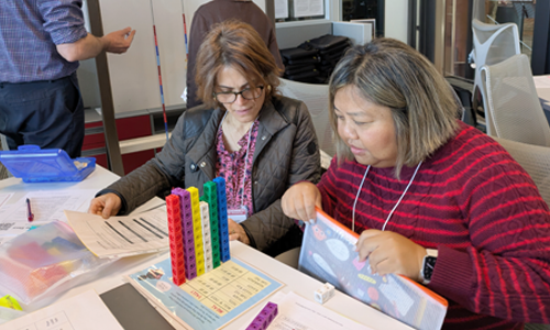 Two participants from the WPI STEM Education Center collaborate in one of the sessions.
