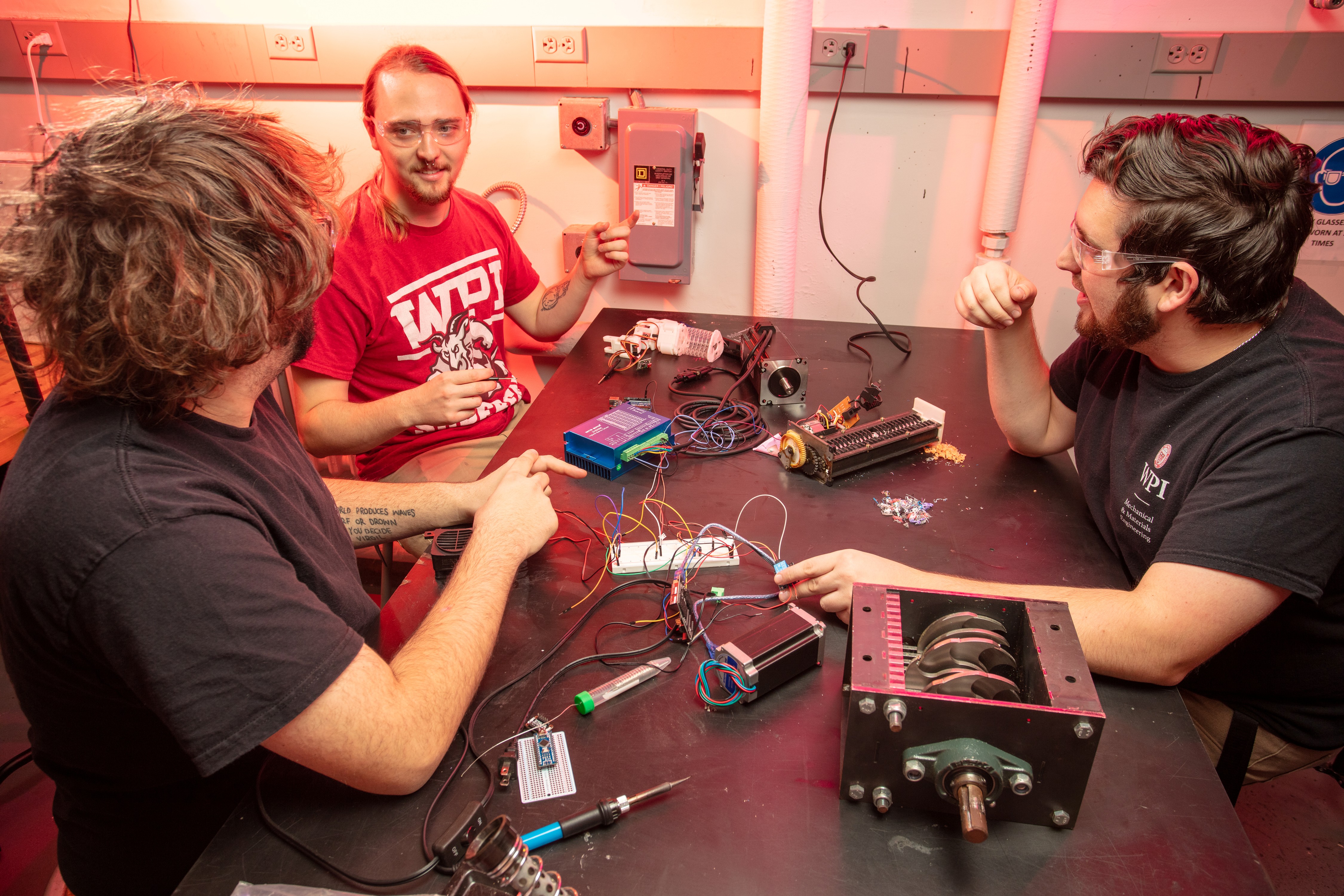 3 men in a lab