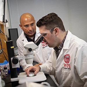 Professors collaborating in a lab
