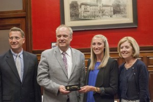 Mayor Joe Petty and Liz Pellegrini hold the Key to the City, flanked by her parents, Hon. Robert and Linda Pellegrini.