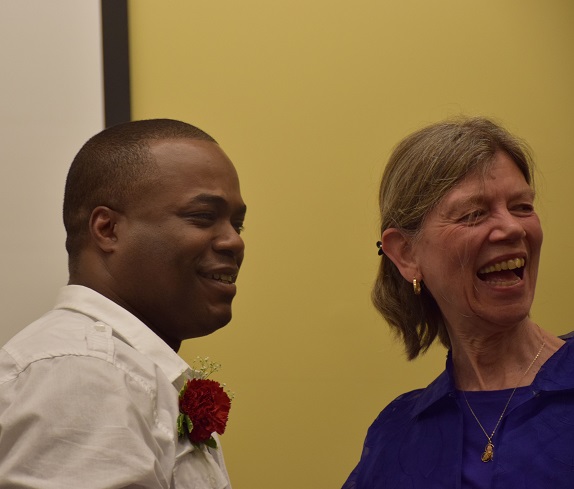 Clemente graduate Stanley Louisville with Clemente instructor and WPI associate professor Ruth Smith.