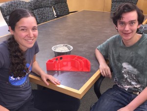Sarah Chamberlain ’16 and Richard Eberheim ’17 with a portion of a scale model habitat that can be produced from a 3-D printer.