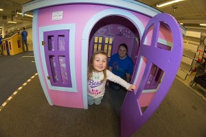 A happy playhouse owner and her mom try it out.