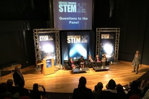 Suzanne Sontgerath, seated at left, and panelists take questions from the audience.