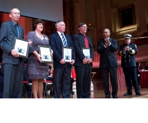 From left, Professors Orr, Notarianni,  Duckworth, and Cyganski receive the 2012 Massachusetts Fire Marshal’s Award from Governor Deval Patrick for their research on first responder technology.
