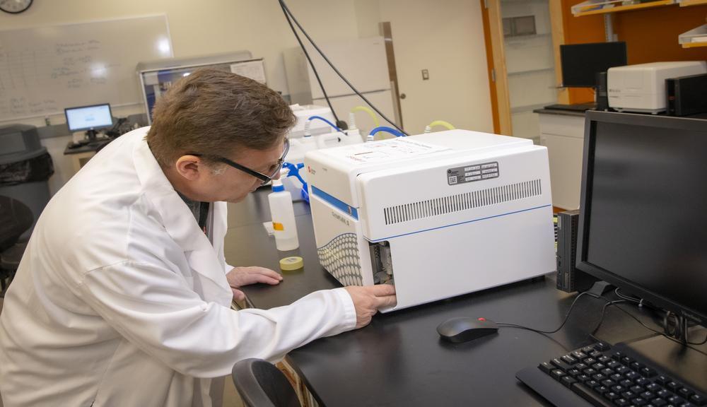 A scientist working with diffusers