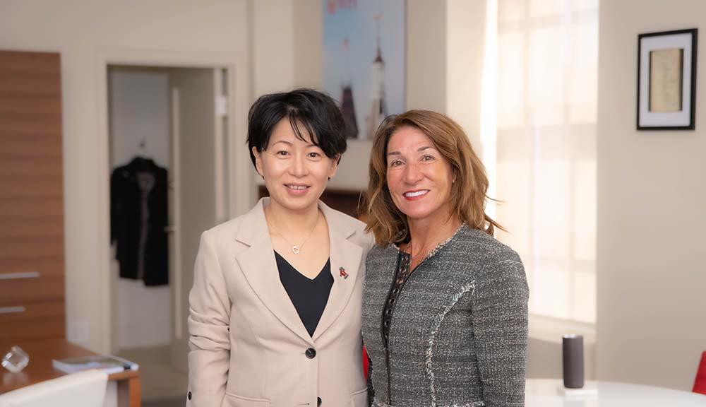 Grace Wang smiles for a photo with Karyn Polito.