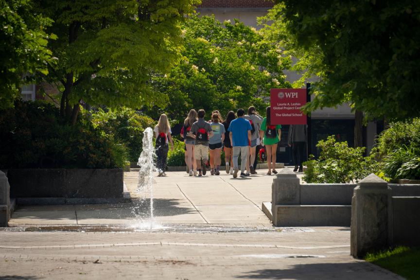 New students walk through campus during the First-Year Welcome Experience.