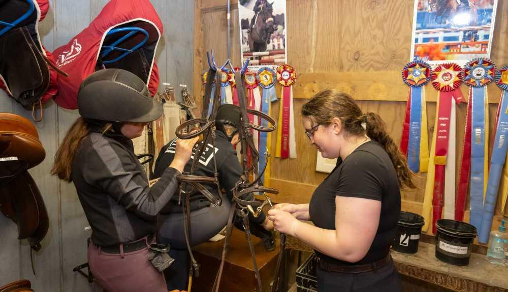 Students working on Horse saddle
