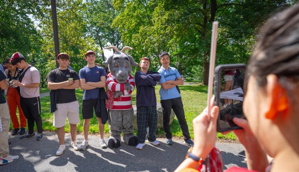 students posing for a photo with gompei