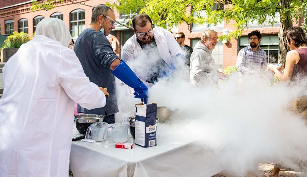 Faculty members make ice cream out of liquid nitrogen on campus during Wellness Day.