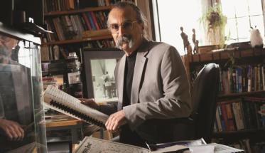Rich Falco sits in his office in Alden Memorial surrounded by jazz memoriabilia