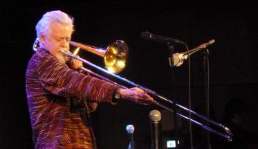 Roswell Rudd performs onstage.