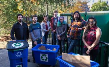 WPI Assistant Professor Berk Calli will work with students on a project to develop robotics technologies for recycling centers. From left, James Akl, Fadi  Alladkani, Arianna Kan, Kyle Heavey, Mikayla Fischler, Calli and Snehal Dikhale.