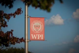 WPI banner on campus