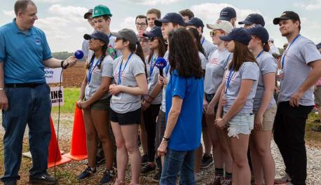 Group of WPI students being interviewed at NASA Rocket event