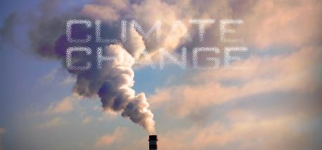 Climate change banner with power plant smokestack in background