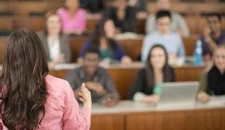 Stock photo of a woman professor in a classroom