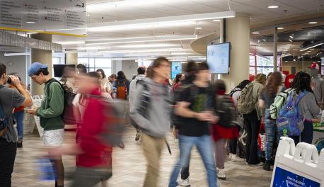 Students walk through the campus center.