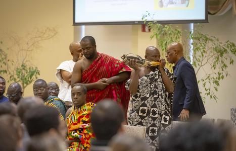 Traditional African horn sounded before the Okyenhene spoke to the crowd