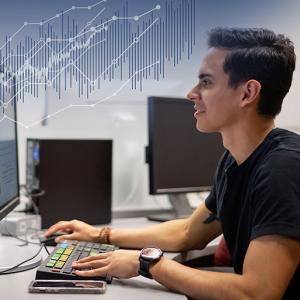 Masters of Financial Tech Student Working on Project on Computer