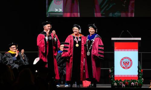 WPI President Grace Wang and Presidential Medal recipient Judith Nitsch stand together on stage