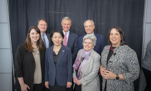 President Grace Wang stands with elected leaders of Worcester and Massachusetts