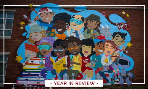 Year in Review photo with DEI mural