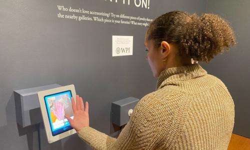 Museum visitor using the try it on app